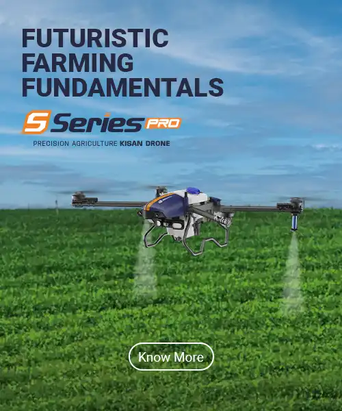 S-series of agricultural drones spraying  the water onto the  green crops below accompanied by clouds in the sky.