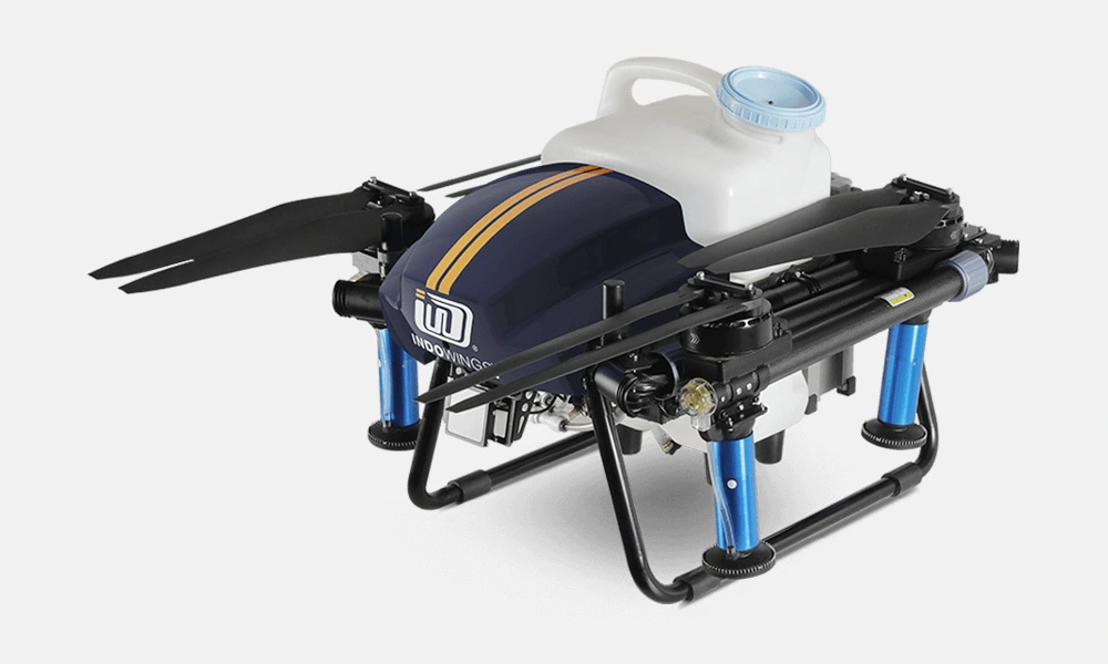 Agriculture Drone with different series in black and white colored and there is
                     water can fit in it of white colored has placed on white colored background