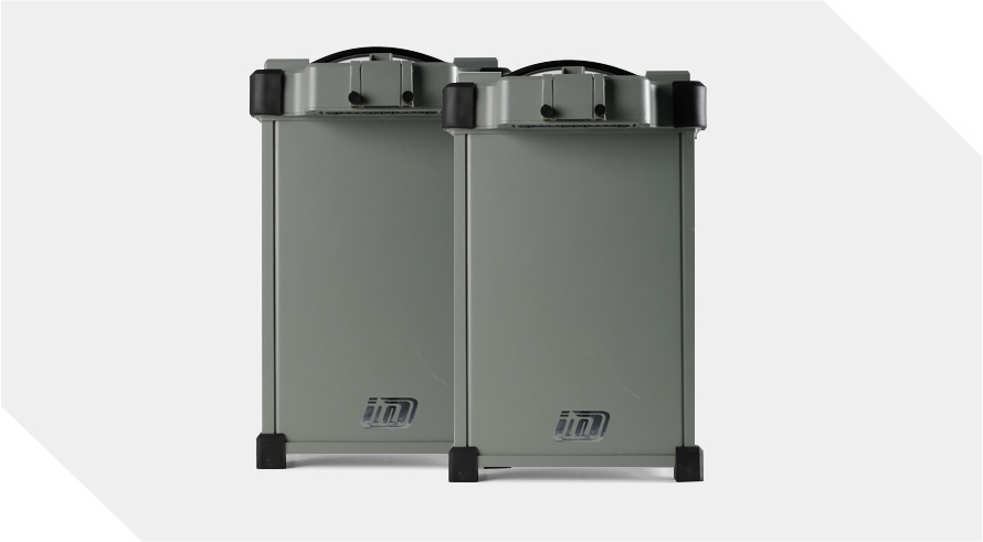 Green crops with sky view with e-series pro of agricultural drone is spraying water onto the crops.