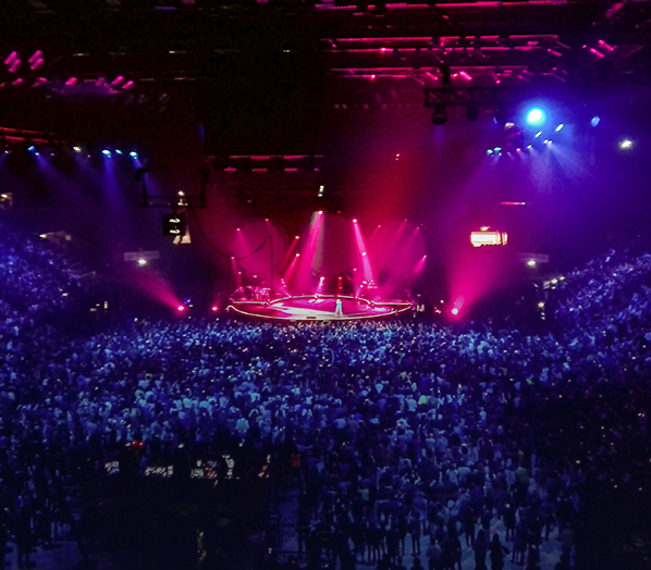 A pillar like with attached three radars with two cameras on this in brown and copper colour.