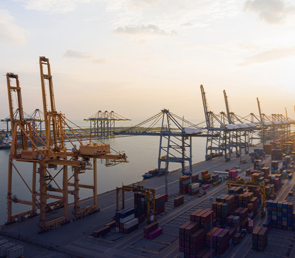 A pillar like with attached three radars with two cameras on this in brown and copper colour.